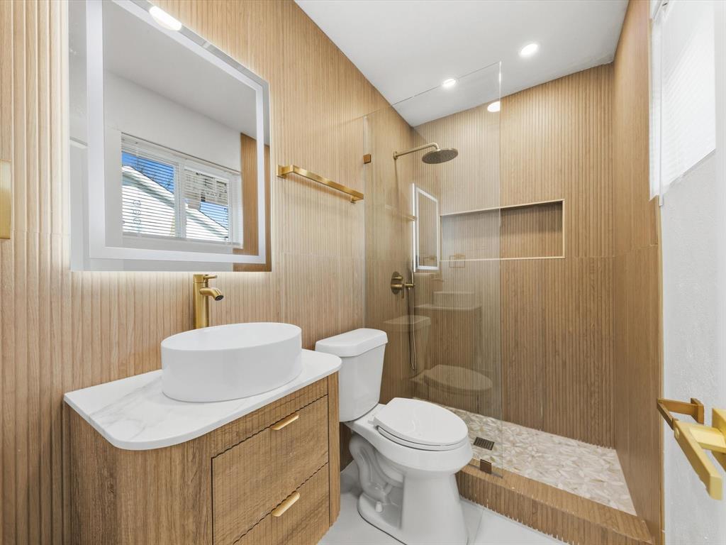 4013 Oleander Trail Mesquite, TX 75150 - Photo 14 of 28 Bathroom featuring vanity and a walk in shower