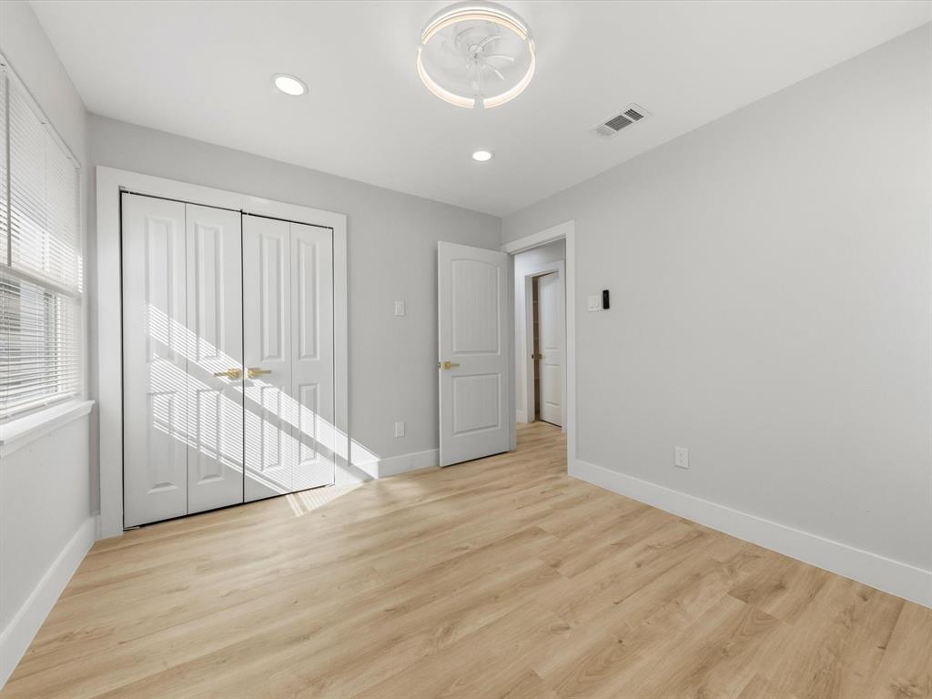 4013 Oleander Trail Mesquite, TX 75150 - Photo 17 of 28 Unfurnished bedroom featuring a closet, light wood-style floors, and recessed lighting