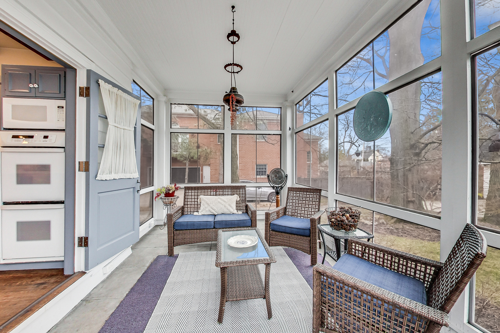 405 North Ashland Avenue Park Ridge, IL 60068 - Photo 17 of 30 a living room with furniture a large window and a rug