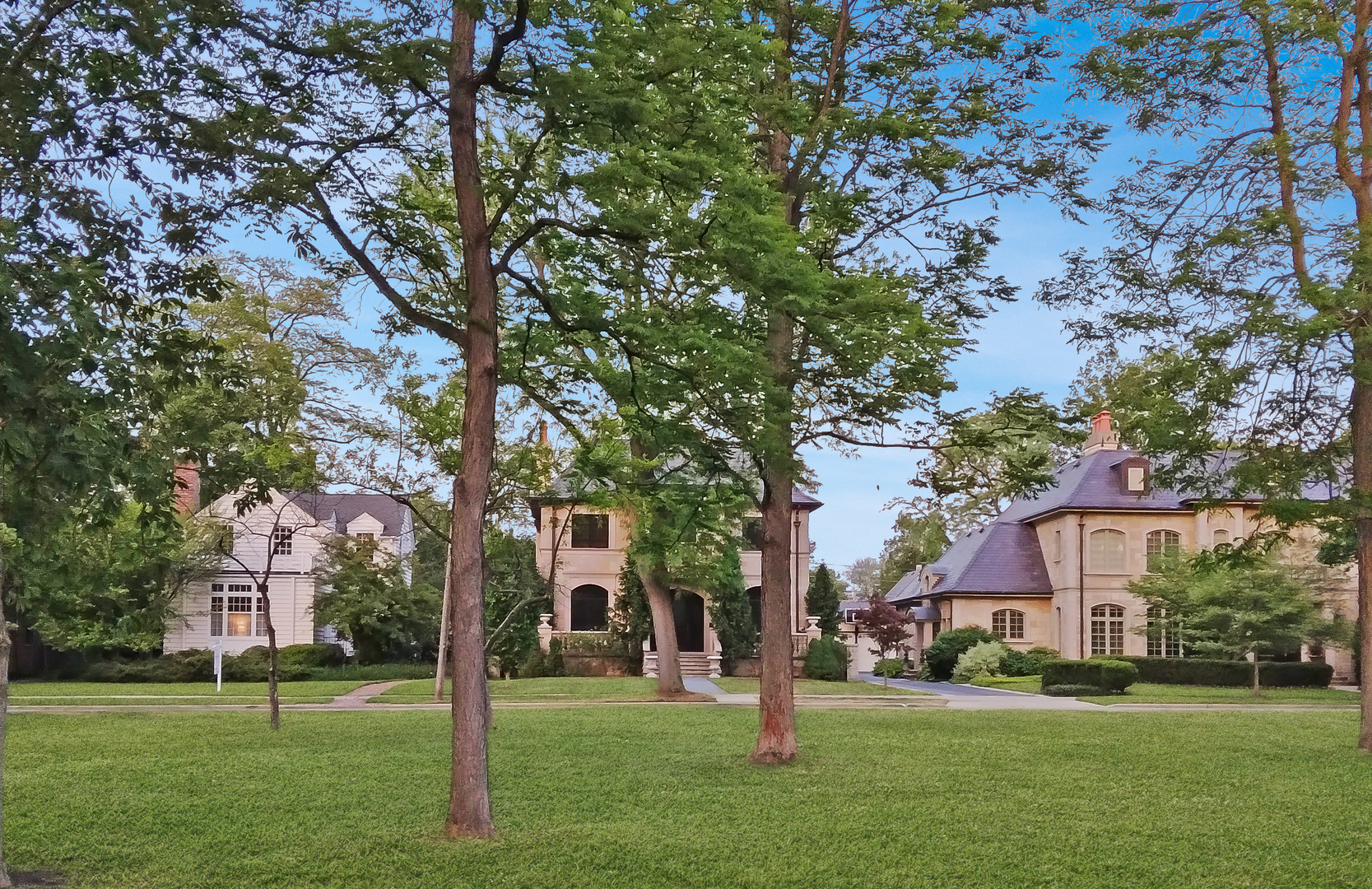 405 North Ashland Avenue Park Ridge, IL 60068 - Photo 2 of 30 a front view of a house with a garden