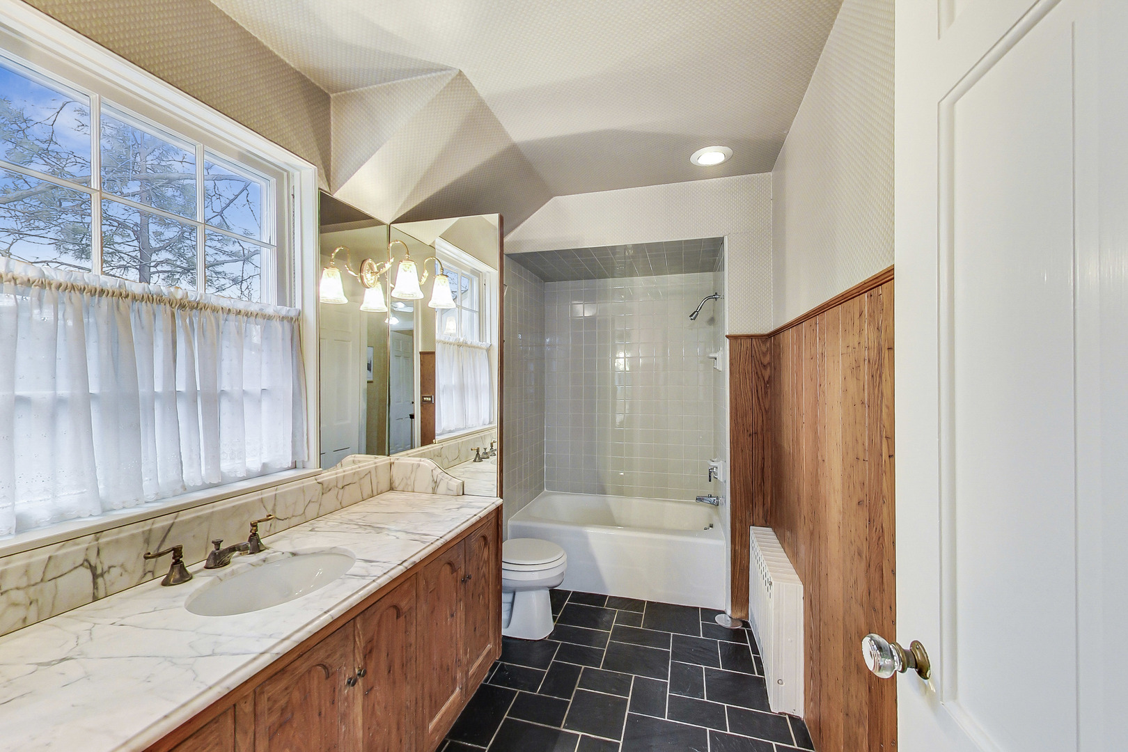 405 North Ashland Avenue Park Ridge, IL 60068 - Photo 27 of 30 a bathroom with a double vanity sink and mirror with shower