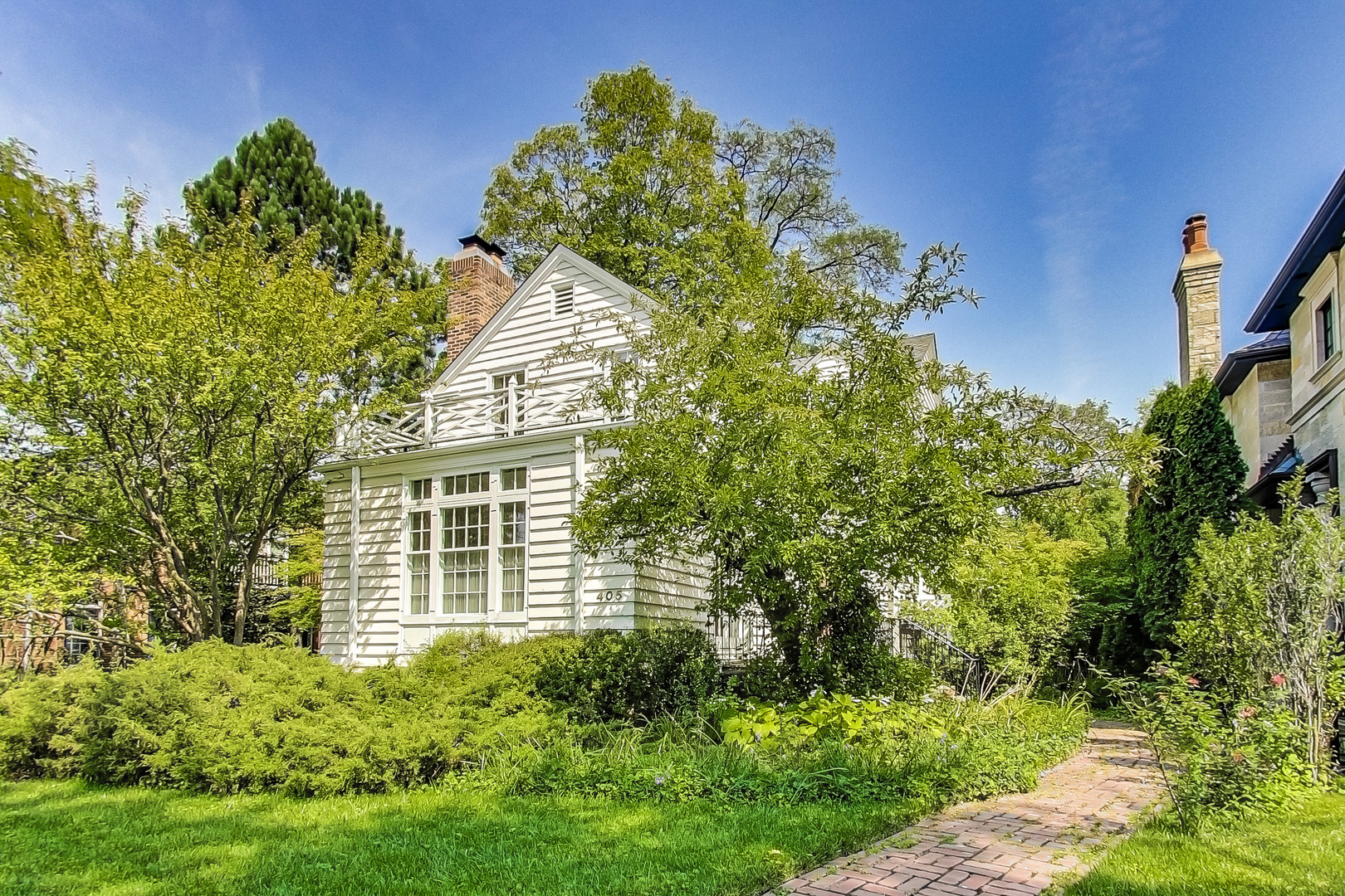 405 North Ashland Avenue Park Ridge, IL 60068 - Photo 3 of 30 a view of a house with a tree