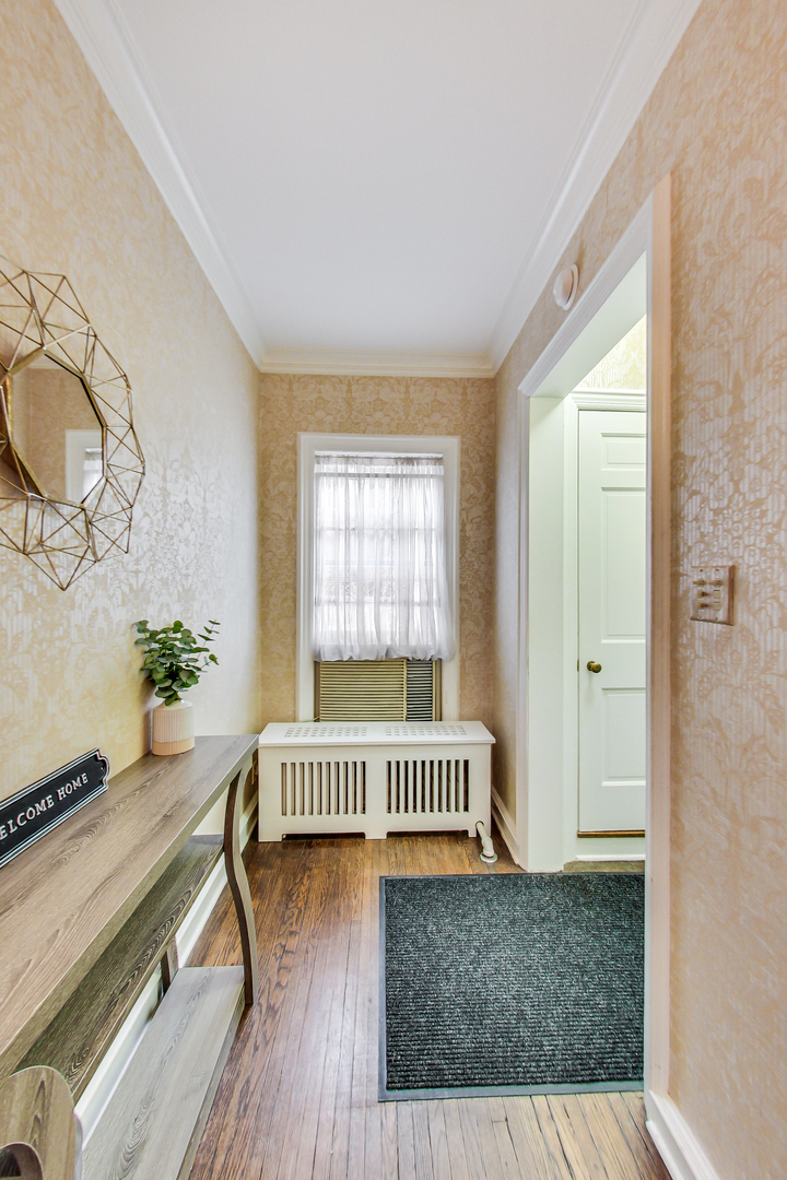 405 North Ashland Avenue Park Ridge, IL 60068 - Photo 6 of 30 a living room with furniture and a window