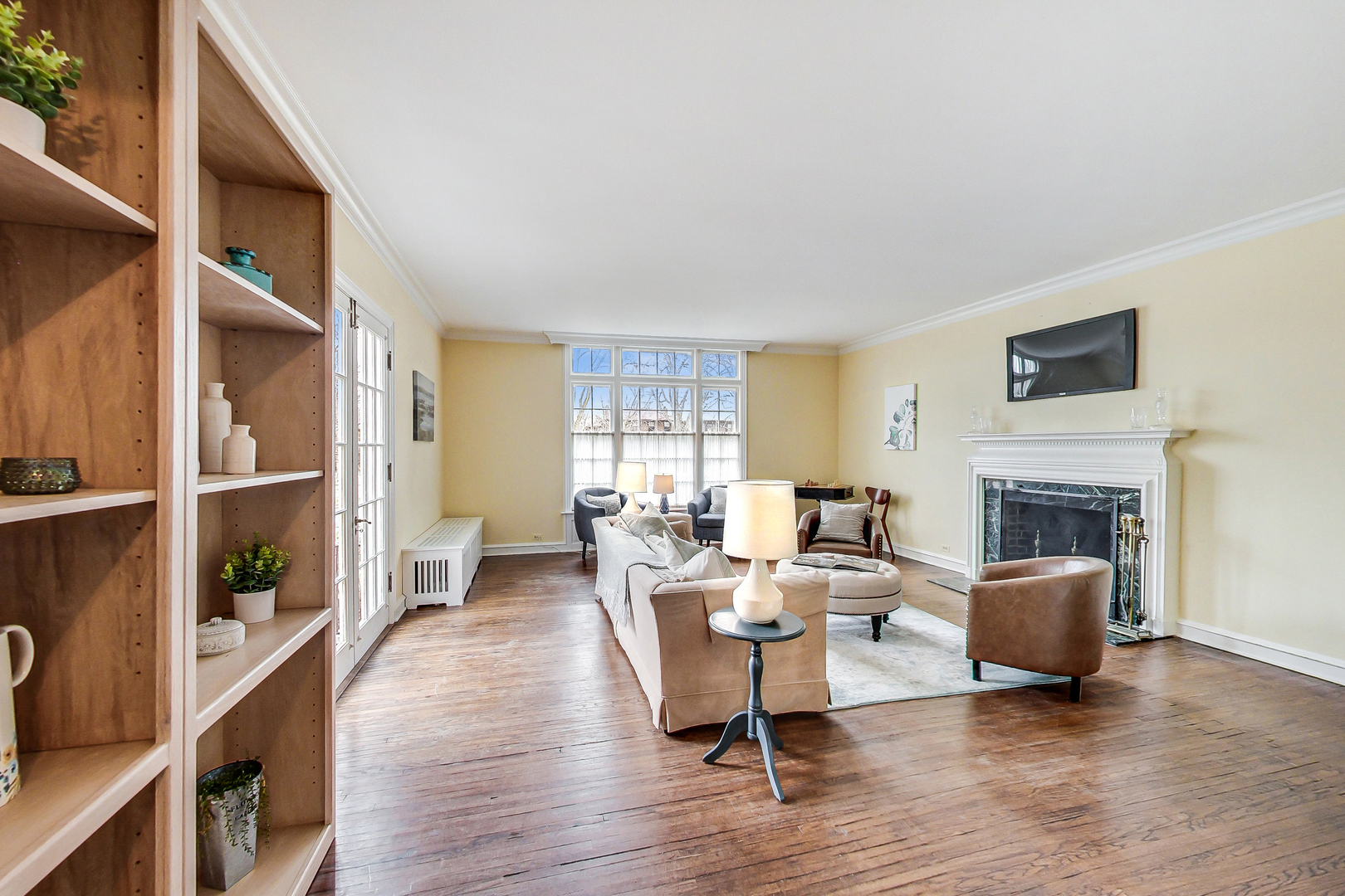 405 North Ashland Avenue Park Ridge, IL 60068 - Photo 8 of 30 a living room with furniture a fireplace and a window