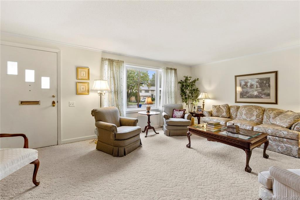 17 Overbrook Road West Hartford, CT 06107 - Photo 1 of 1 a living room with furniture and a large window