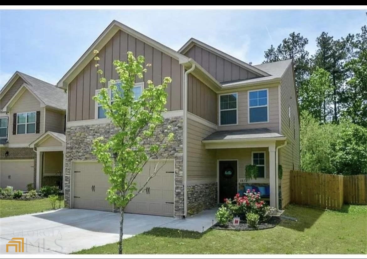 4838 Longview Run Decatur, GA 30035 - Photo 1 of 1 a front view of a house with garden