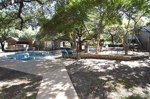 3645 West Northgate Drive, Unit 202 Irving, TX 75062 - Photo 11 of 12 a view of road with trees