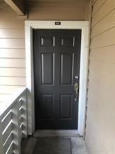 3645 West Northgate Drive, Unit 202 Irving, TX 75062 - Photo 2 of 12 a view of wooden door