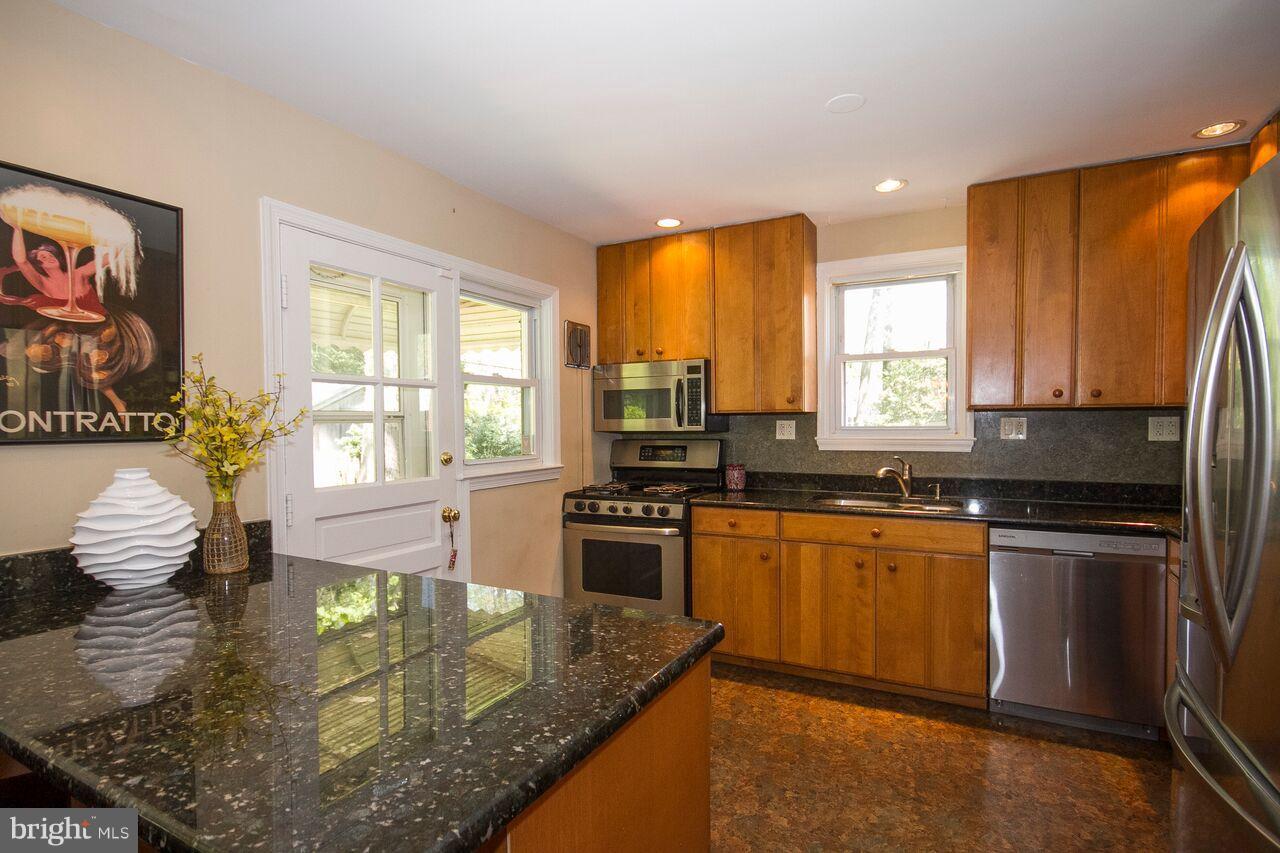 58 Dungarrie Road Baltimore, MD 21228 - Photo 11 of 30 Kitchen with granite counters and SS appliances