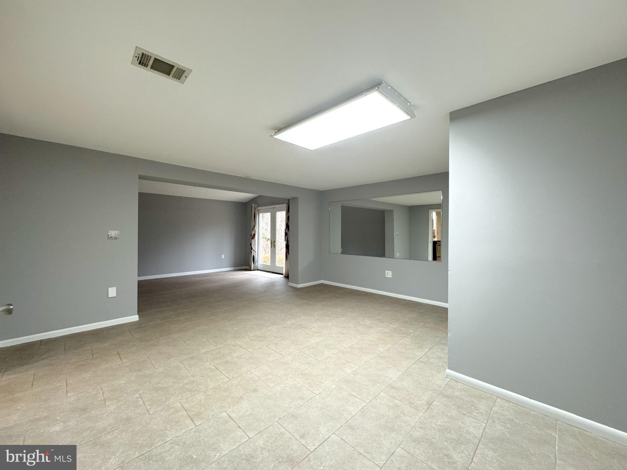 4350 Dalrymple Road Chesapeake Beach, MD 20732 - Photo 14 of 15 a view of a big room with windows and closet