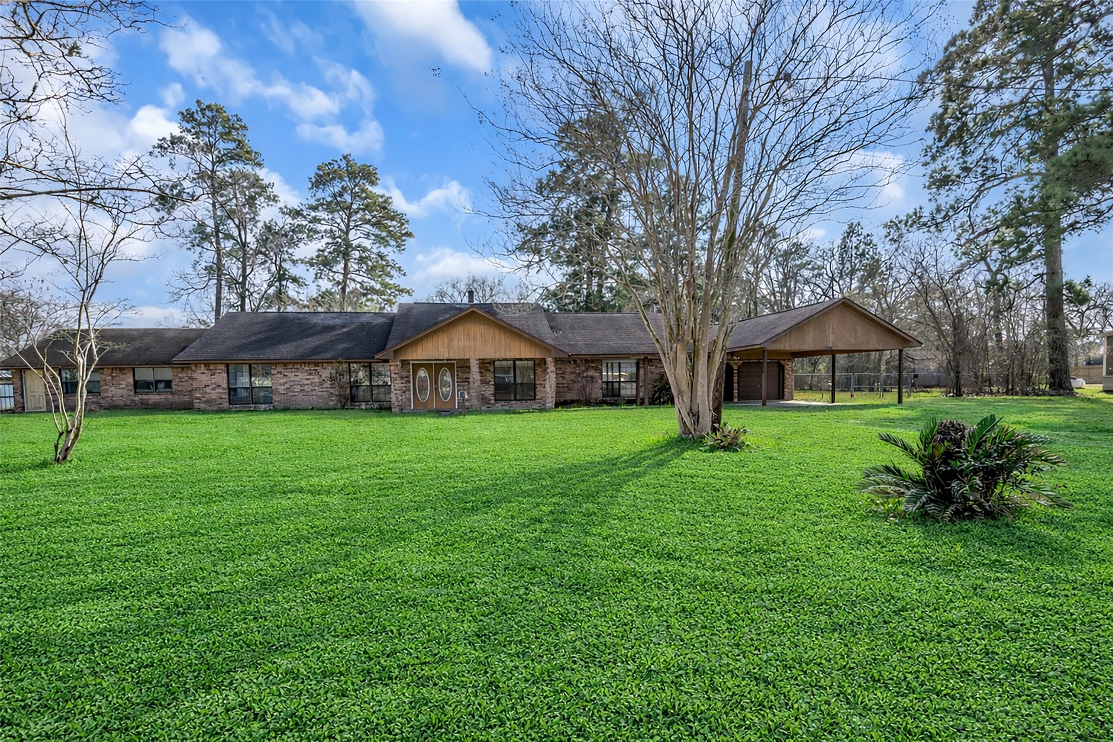 a view of a house with a yard