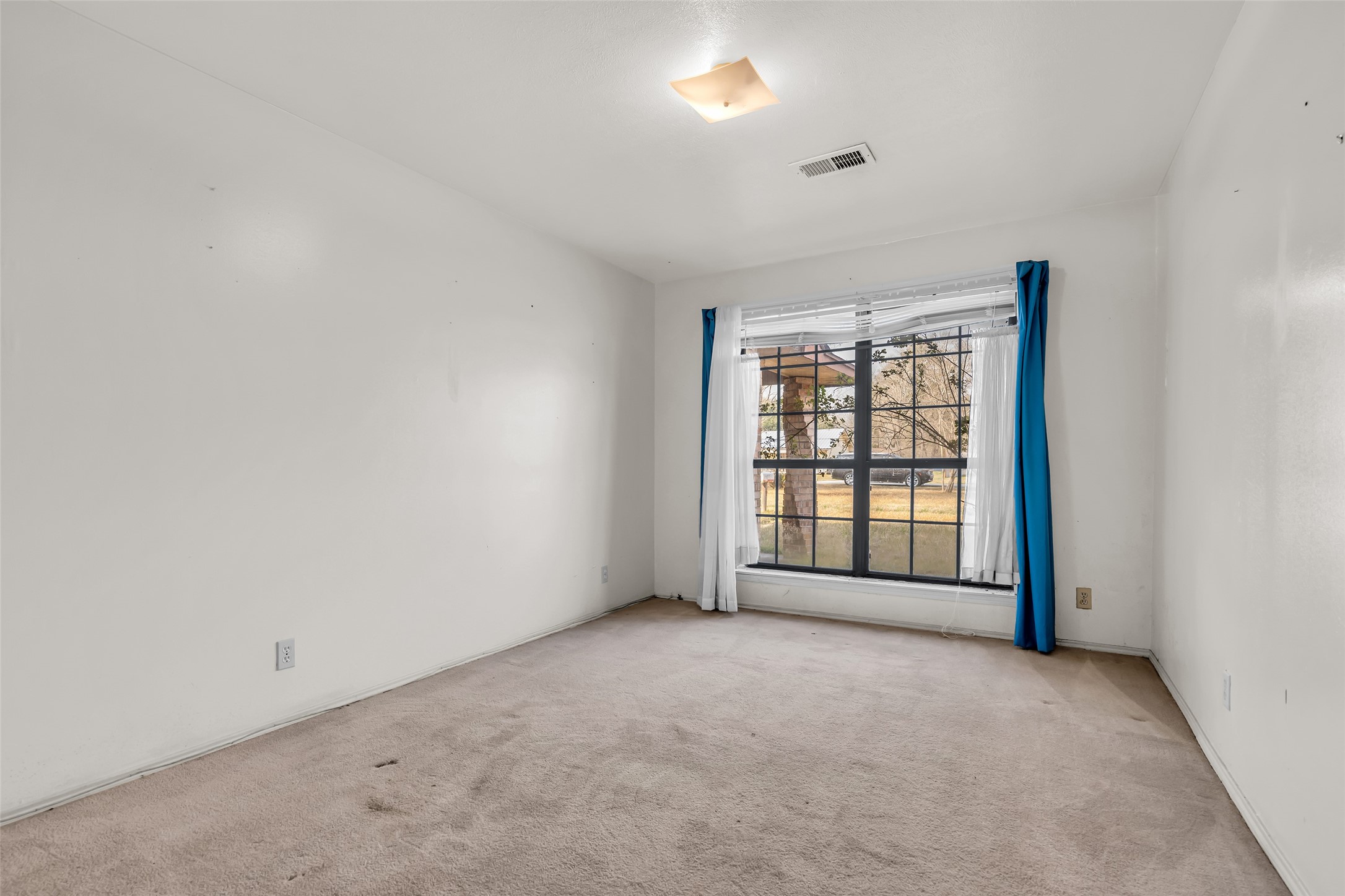 22980 Jade Street Porter, TX 77365 - Photo 14 of 32 an empty room with a window