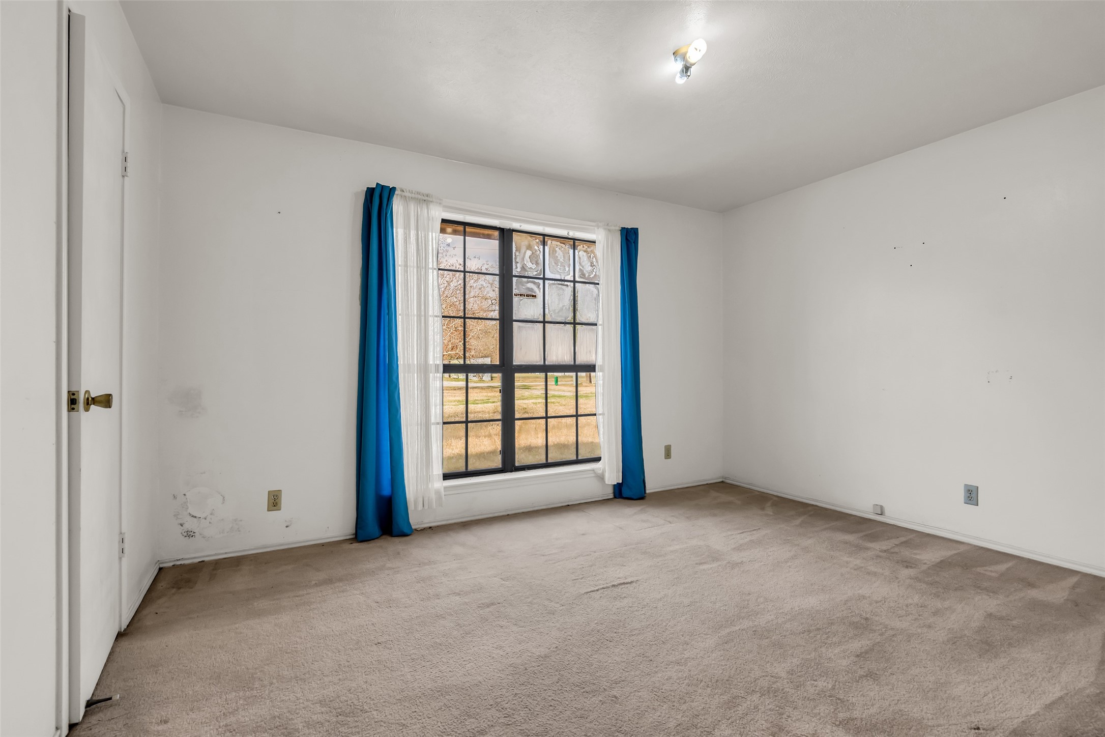 22980 Jade Street Porter, TX 77365 - Photo 15 of 32 a view of an empty room with a window