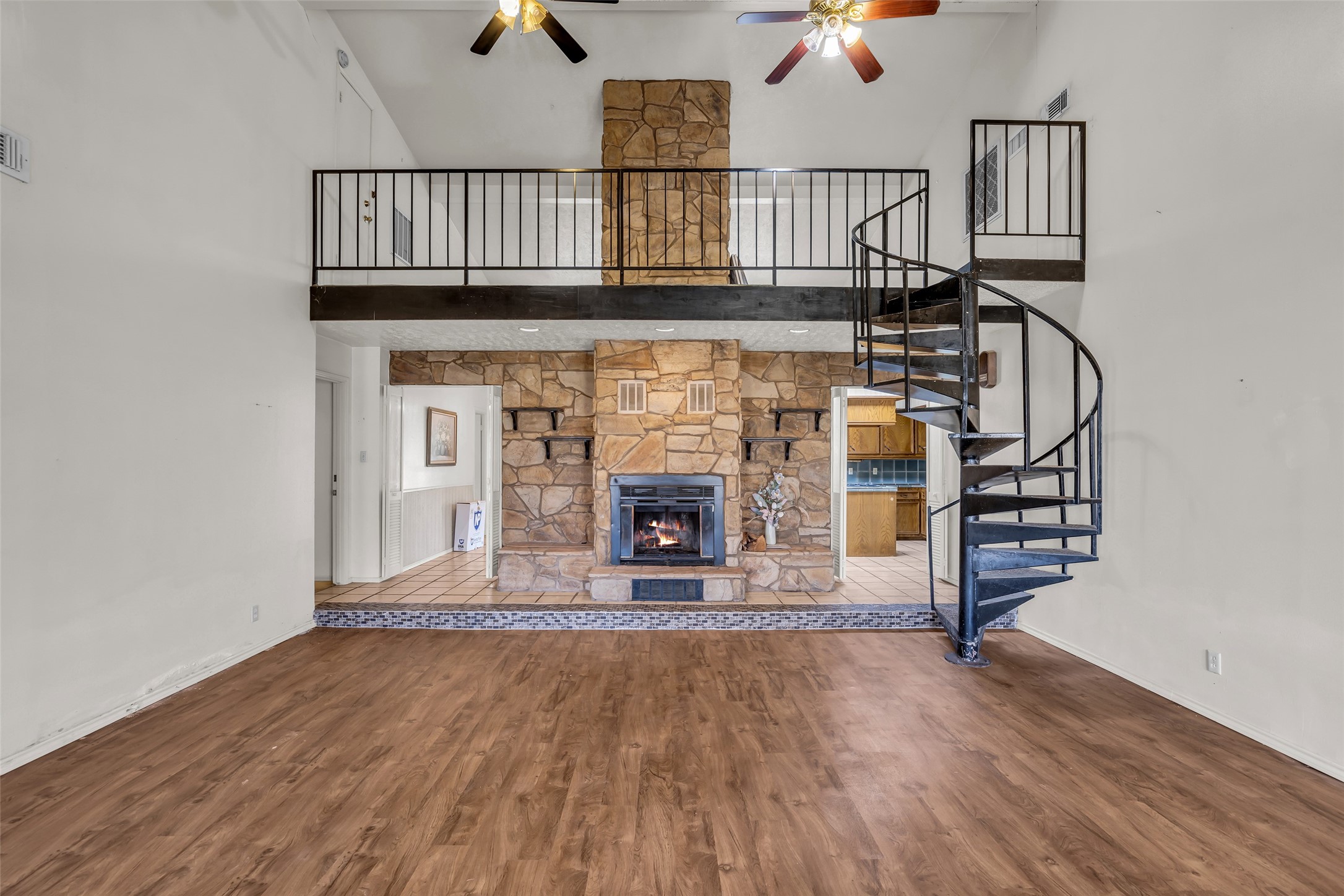 22980 Jade Street Porter, TX 77365 - Photo 2 of 32 an entryway with a fireplace