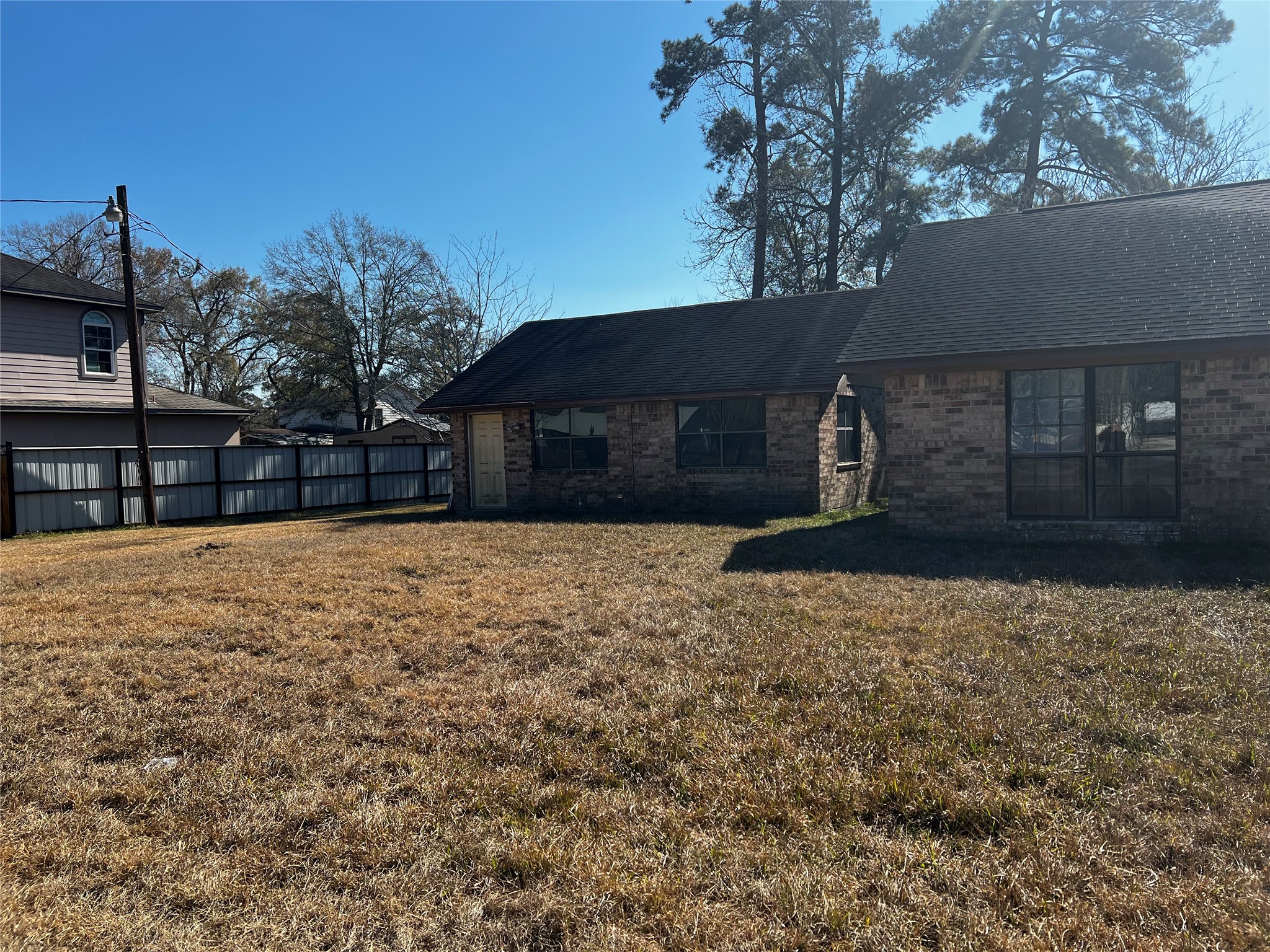 22980 Jade Street Porter, TX 77365 - Photo 30 of 32 a house view with a outdoor space