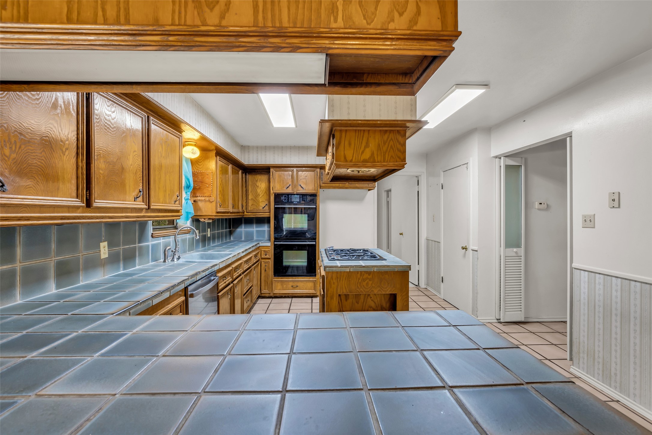 22980 Jade Street Porter, TX 77365 - Photo 6 of 32 a view of a room with wooden floor and furniture