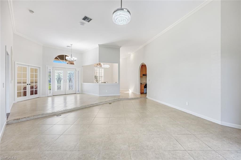2035 Castle Garden Lane Naples, FL 34110 - Photo 12 of 40 a view of empty room with a window
