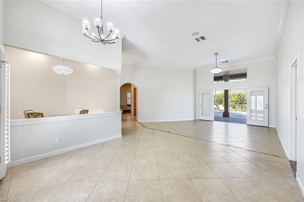 2035 Castle Garden Lane Naples, FL 34110 - Photo 13 of 40 a view of kitchen with furniture and window