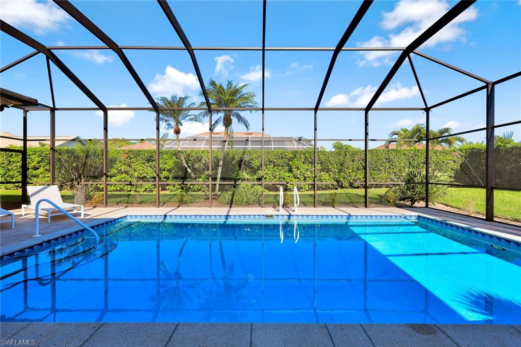 2035 Castle Garden Lane Naples, FL 34110 - Photo 32 of 40 a view of swimming pool with porch and outdoor space