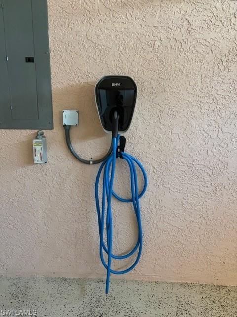 2035 Castle Garden Lane Naples, FL 34110 - Photo 33 of 40 a bathroom with a sink and a mirror