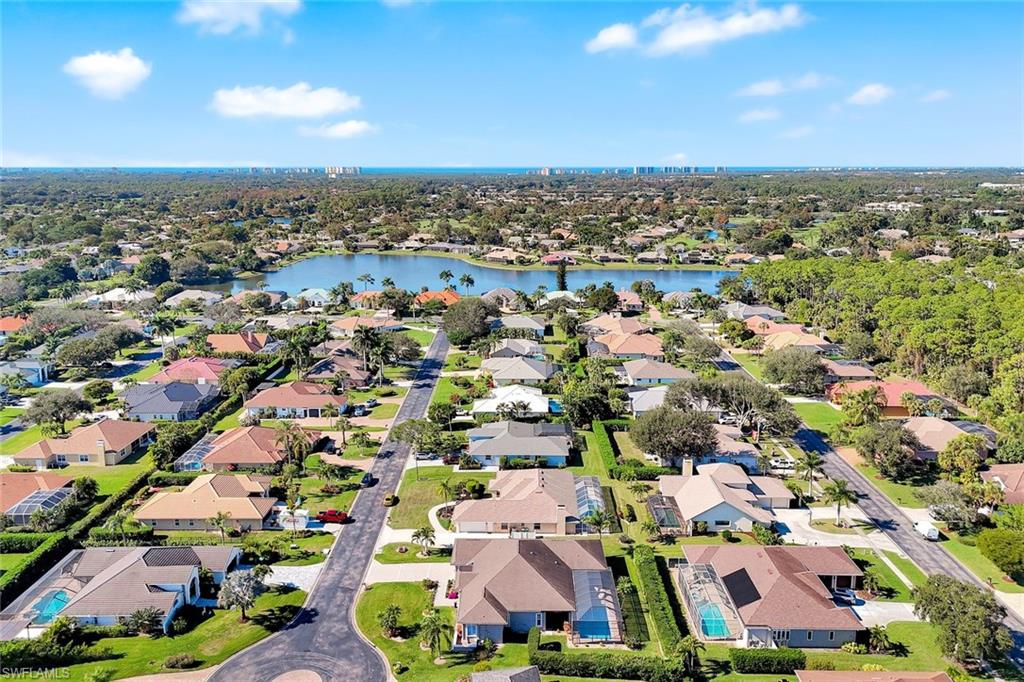 2035 Castle Garden Lane Naples, FL 34110 - Photo 37 of 40 an aerial view of multiple house