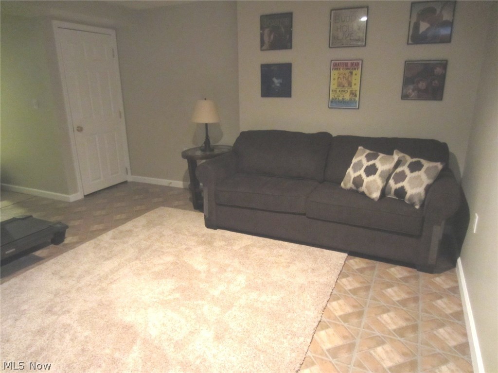 1202 Windmill Way South Avon, OH 44011 - Photo 7 of 23 Lower Level Family Room with Full Bath