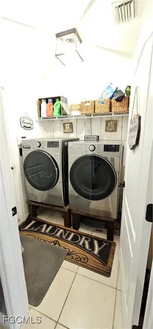 a kitchen with a sink a stove and a window