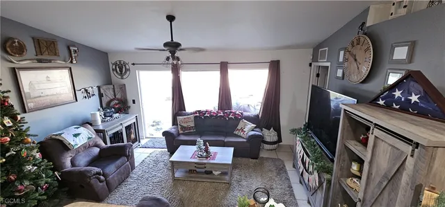 a view of a bedroom with furniture and storage