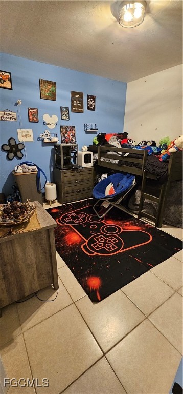3910 23rd Street Southwest Lehigh Acres, FL 33976 - Photo 3 of 16 a living room with furniture and a flat screen tv