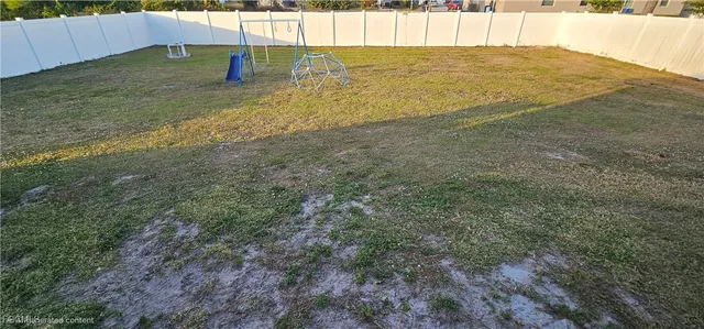 a view of an outdoor space and a yard