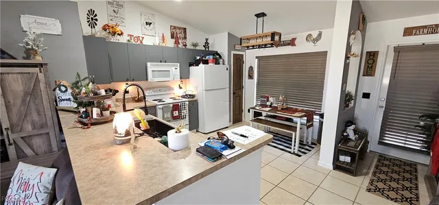 a big house with swimming pool in front of it