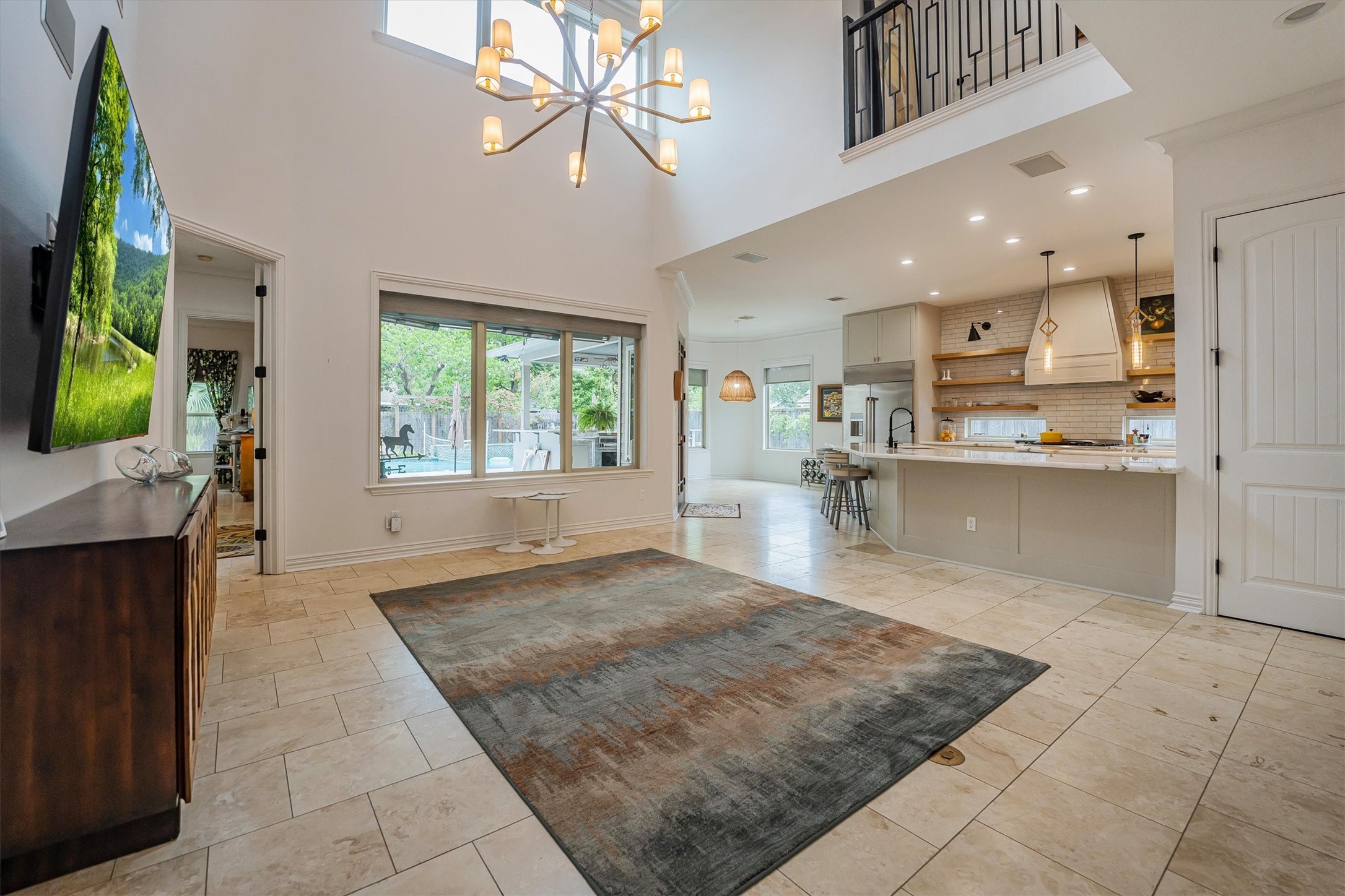 424 West 32nd Street Houston, TX 77018 - Photo 9 of 50 Enjoy the open hi ceiling living space with ease and flow not only to kitchen, breakfast, and owners retreat wing, but to the great backyard as well.