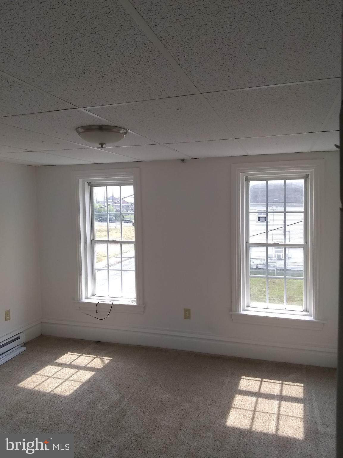 140 Wilson Street, Unit 3 Middletown, PA 17057 - Photo 4 of 6 an empty room with a window