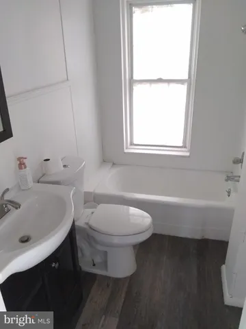 a bathroom with a sink and a toilet