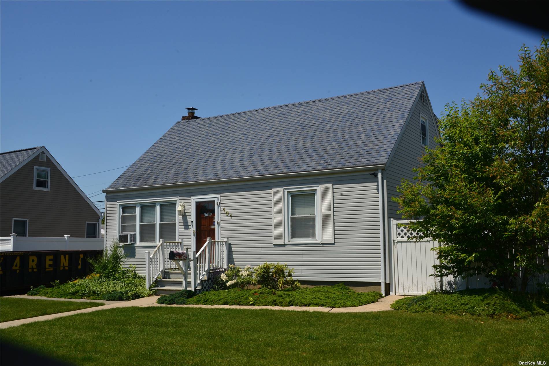 a house view with a garden space