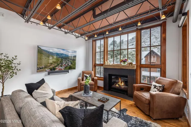 a front view of a residential apartment building with a yard