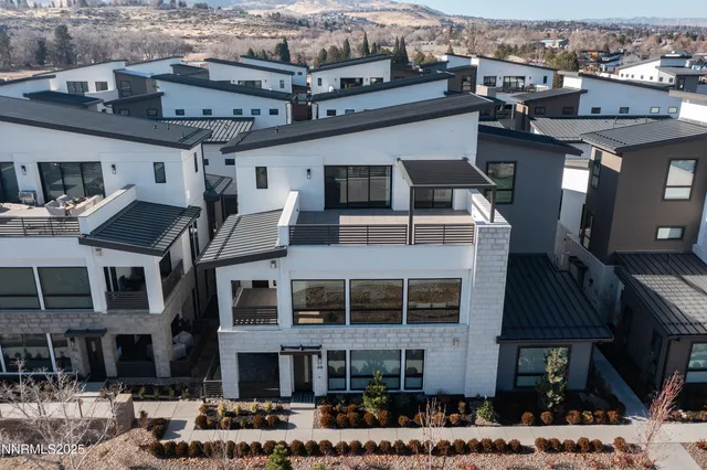 a front view of a building with a lot of windows