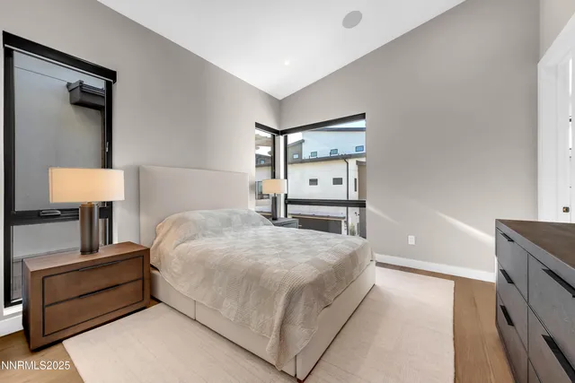 a bedroom with a bed and lamp