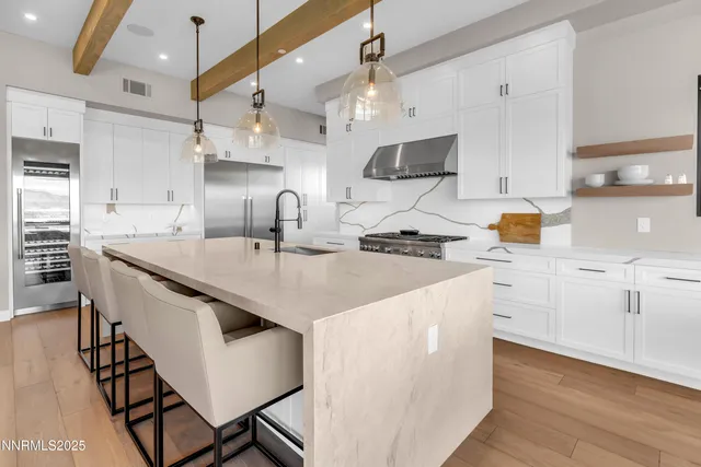 a view of a living room and workspace