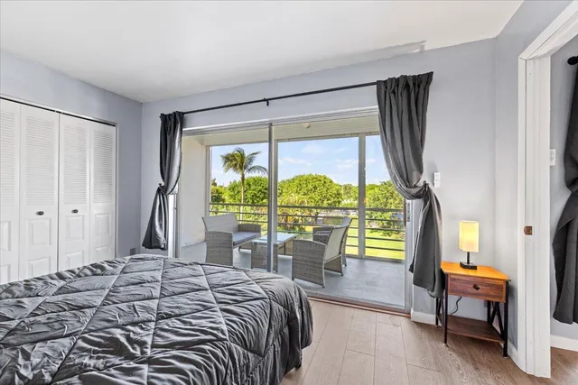 a bedroom with a bed and a walk in closet