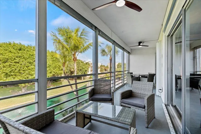 a view of a lake with a building in the background