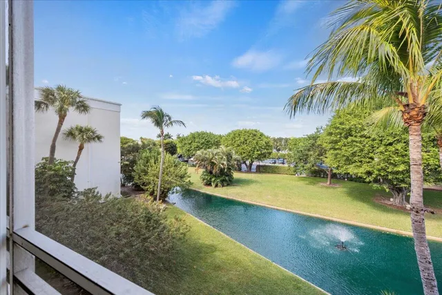 a view of a swimming pool with a sitting space