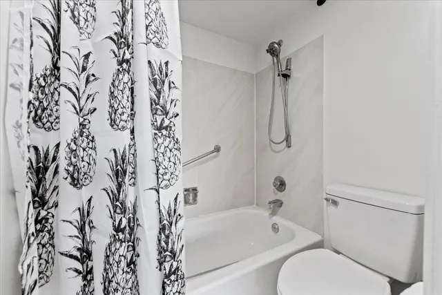 a view of storage and utility room with racks on the wall