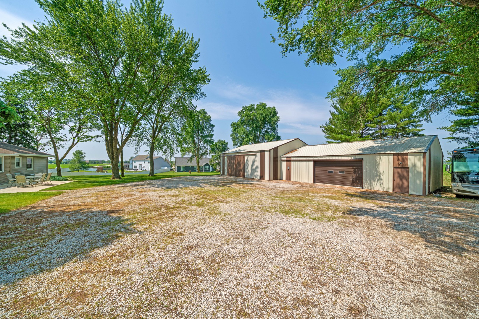 14893 Plank Road Sycamore, IL 60178 - Photo 12 of 33 a house with trees in front of it