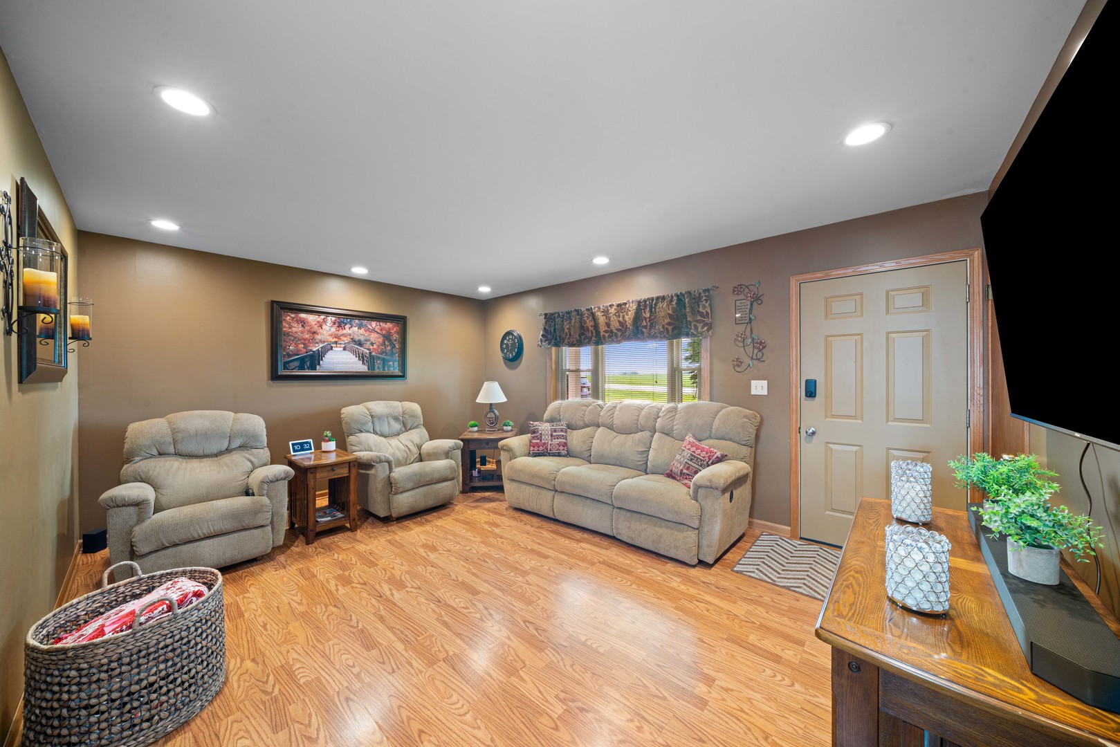 14893 Plank Road Sycamore, IL 60178 - Photo 13 of 33 a living room with furniture and a flat screen tv