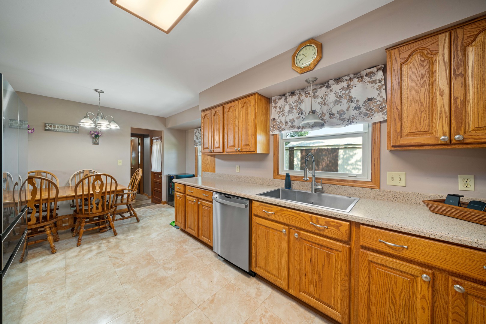 14893 Plank Road Sycamore, IL 60178 - Photo 18 of 33 a kitchen with cabinets a sink and appliances