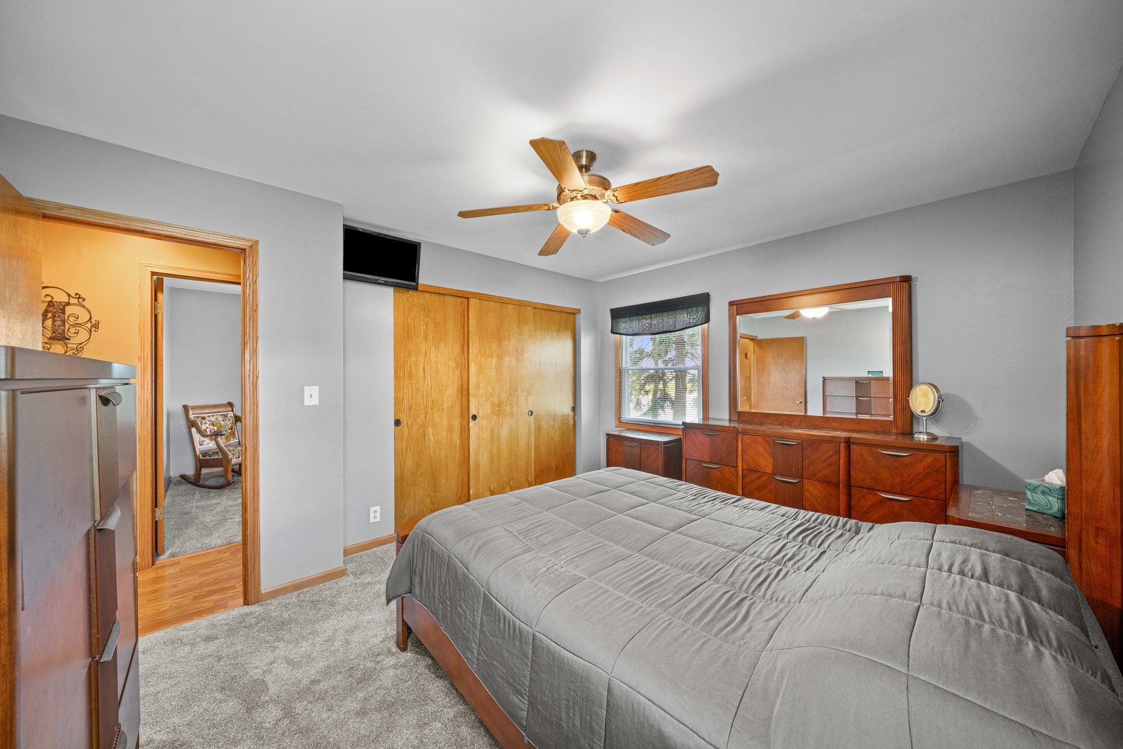 14893 Plank Road Sycamore, IL 60178 - Photo 20 of 33 a bedroom with a bed and a chandelier