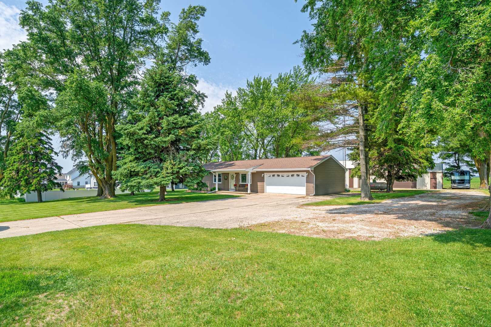 14893 Plank Road Sycamore, IL 60178 - Photo 2 of 33 a view of a yard in front of a house