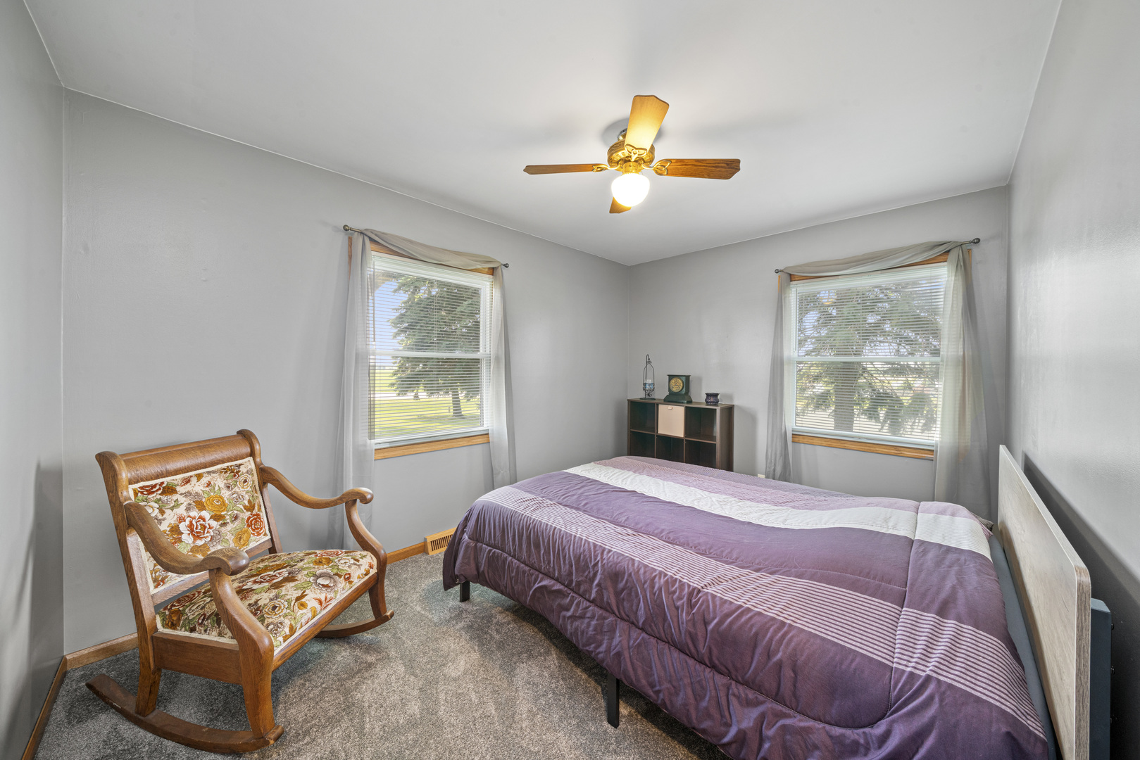 14893 Plank Road Sycamore, IL 60178 - Photo 22 of 33 a bedroom with a bed chair and window