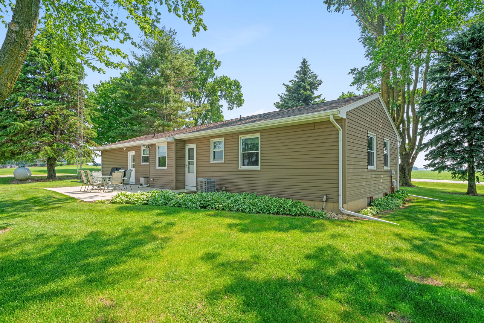 14893 Plank Road Sycamore, IL 60178 - Photo 6 of 33 a view of a backyard of the house